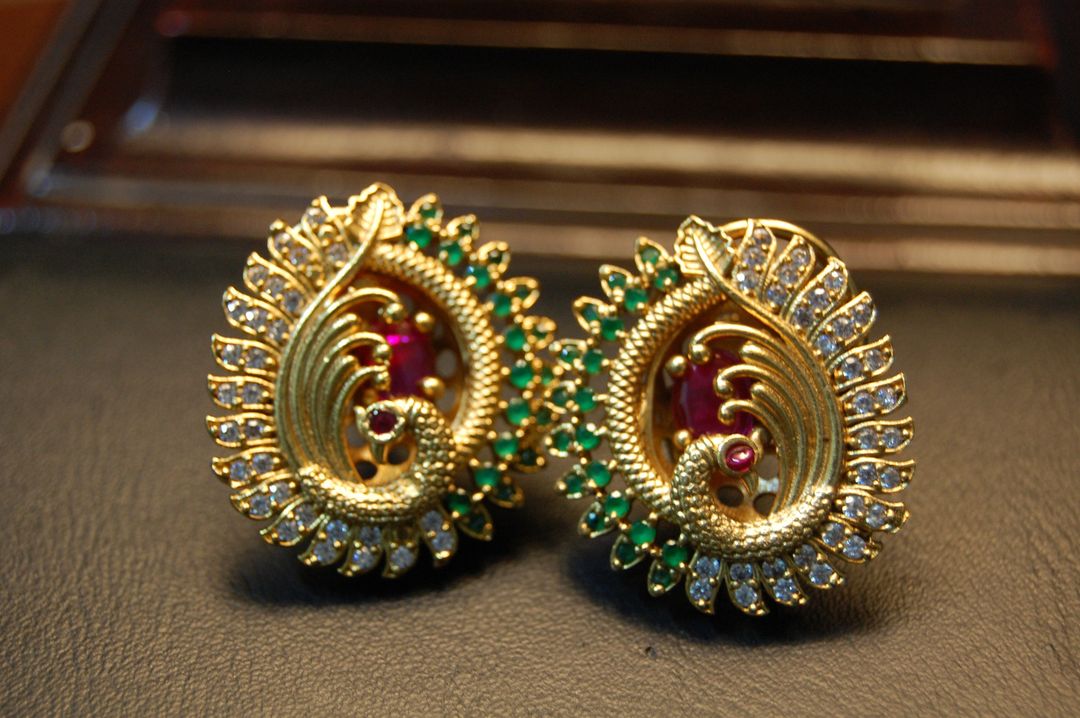 PEACOCK STUDS