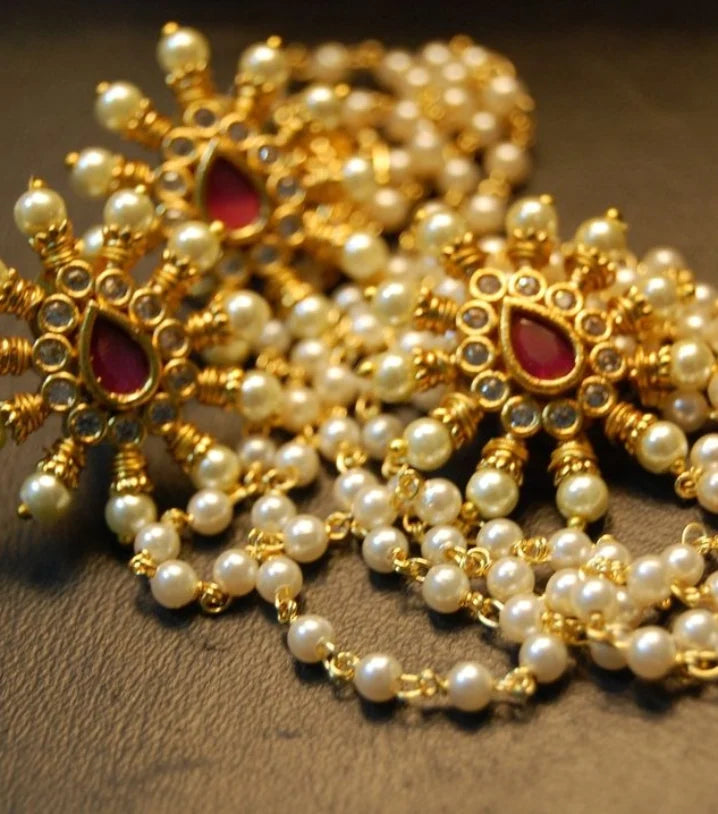 DELICATE RED, KUNDAN & PEARLS PENDENT SETS