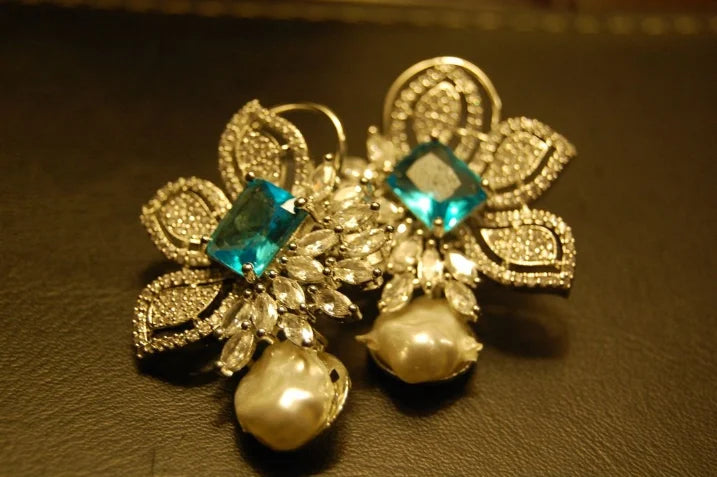 ZIRCON EARRINGS IN FEROZY