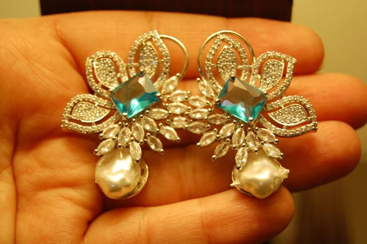 ZIRCON EARRINGS IN FEROZY