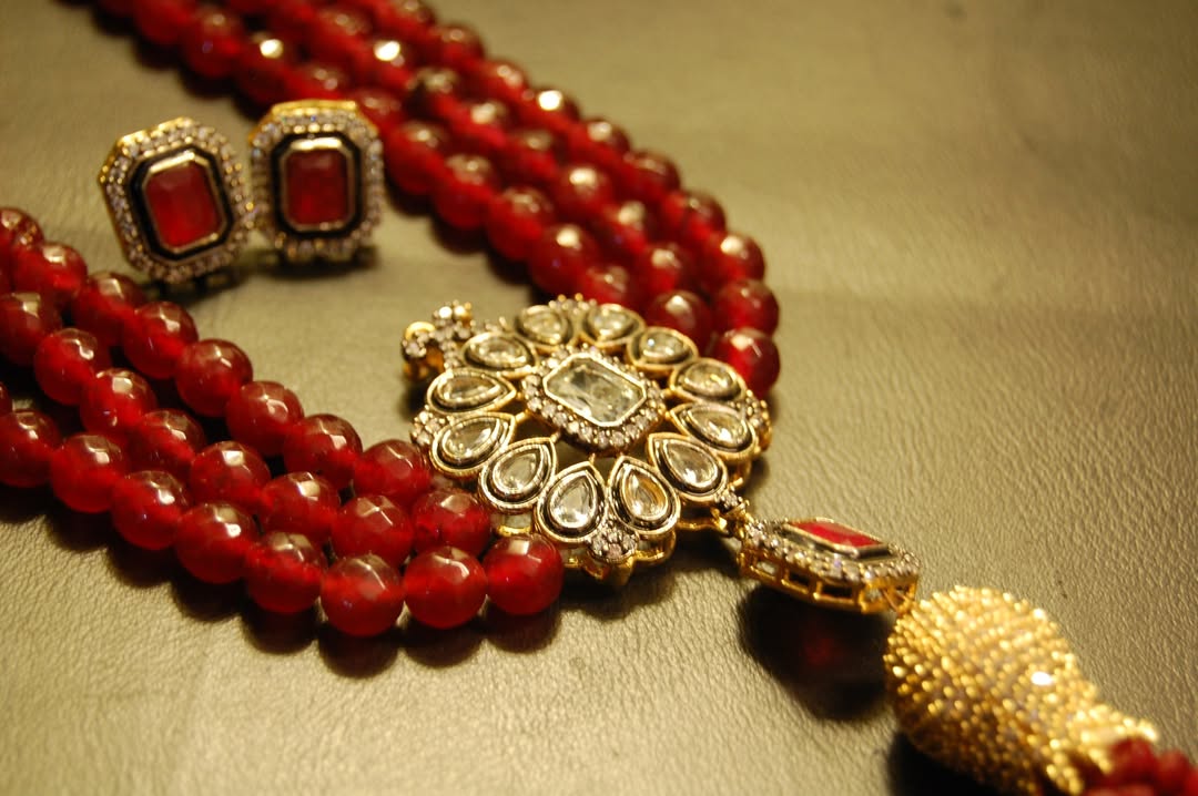 RUBY RED LONG MALA WITH TUSSEL