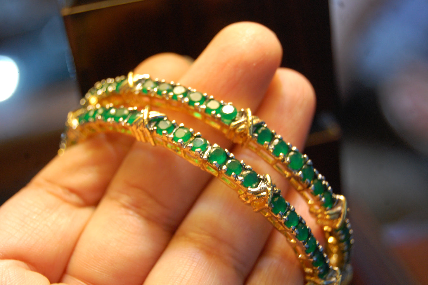 PAIR OF OPENABLE GREEN BANGLES