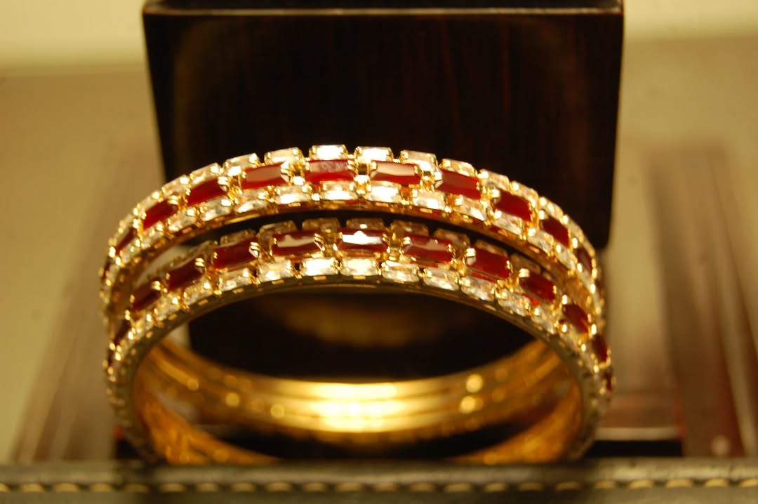 PAIR OF RED & ZIRCON BANGLES IN GOLDEN BASE