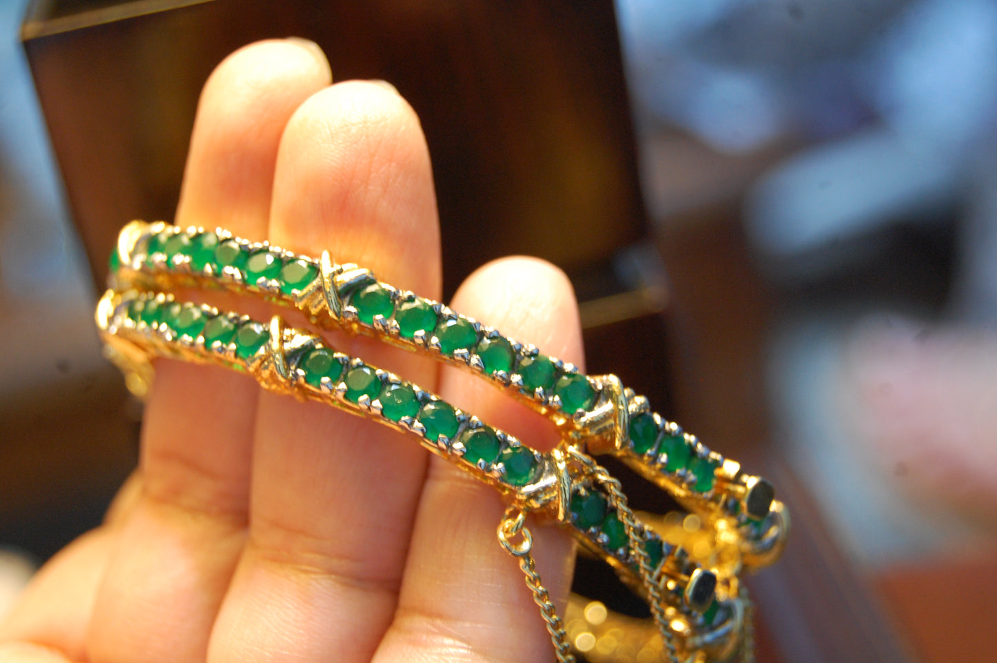 PAIR OF OPENABLE GREEN BANGLES