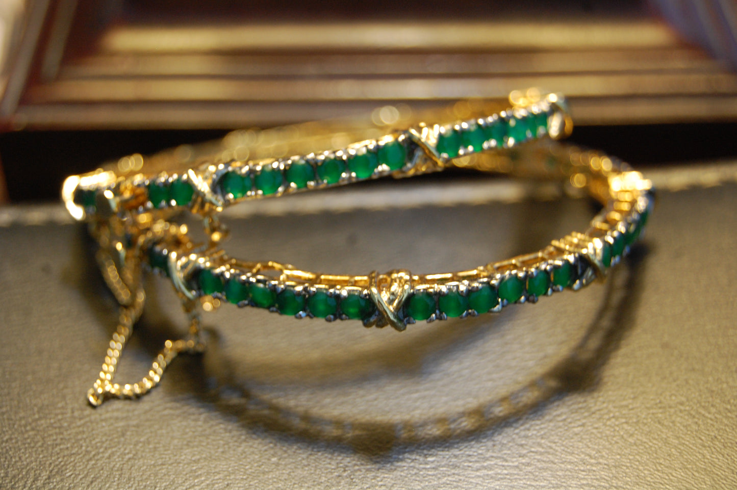 PAIR OF OPENABLE GREEN BANGLES