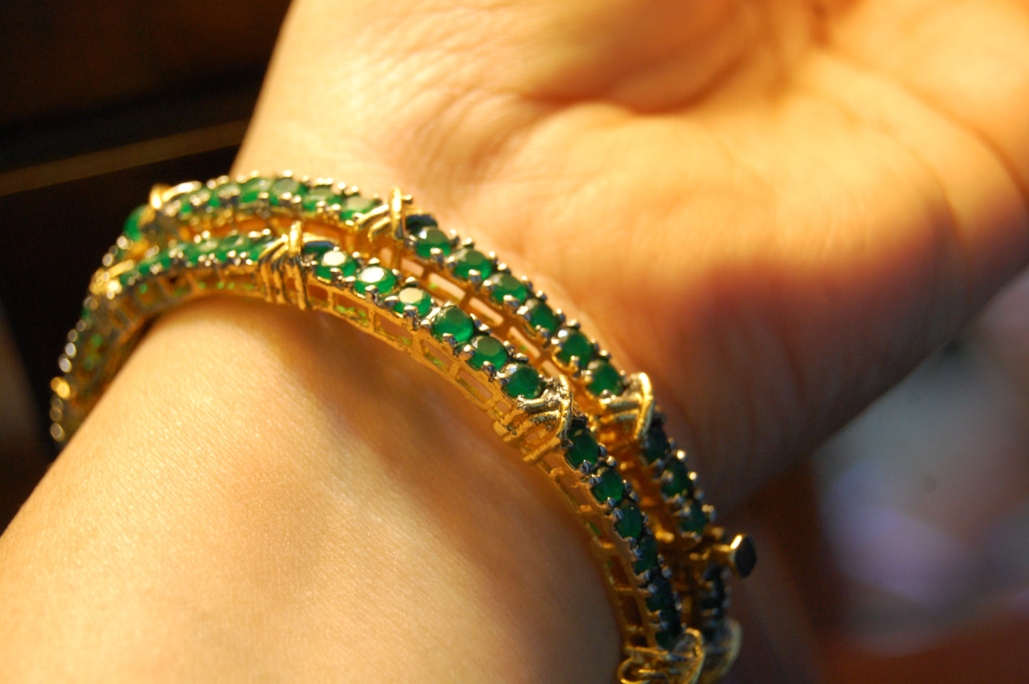 PAIR OF OPENABLE GREEN BANGLES