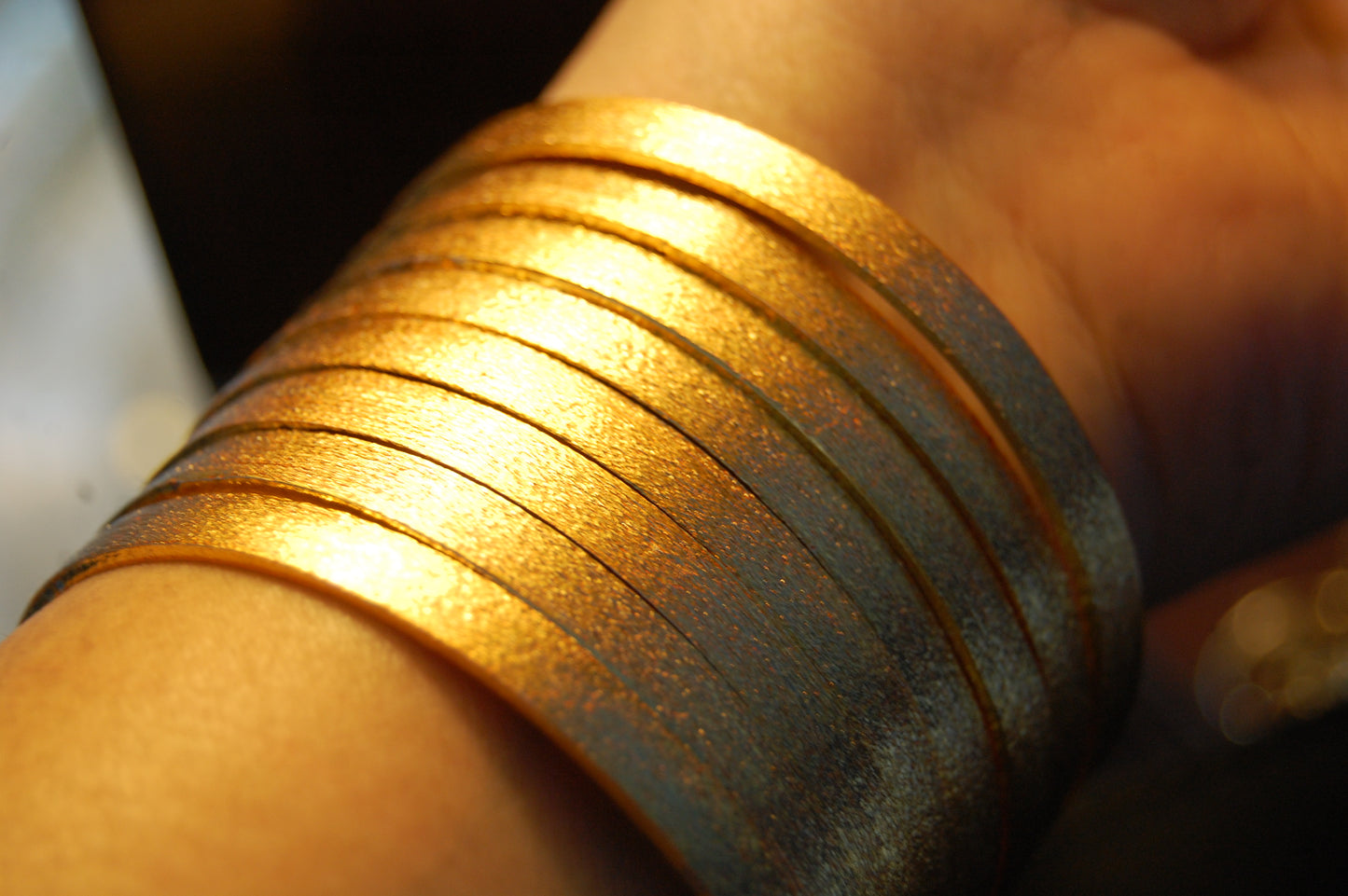 PAIR OF ELEGANT DULL GOLD BANGLES