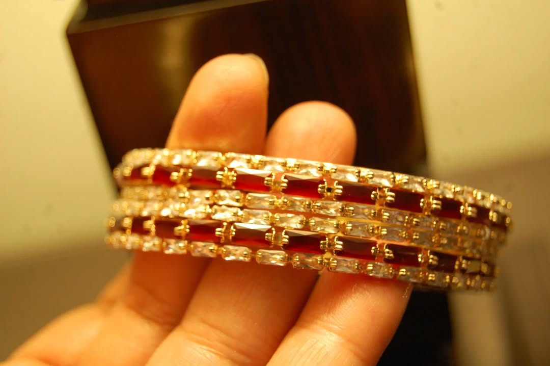 PAIR OF RED & ZIRCON BANGLES IN GOLDEN BASE