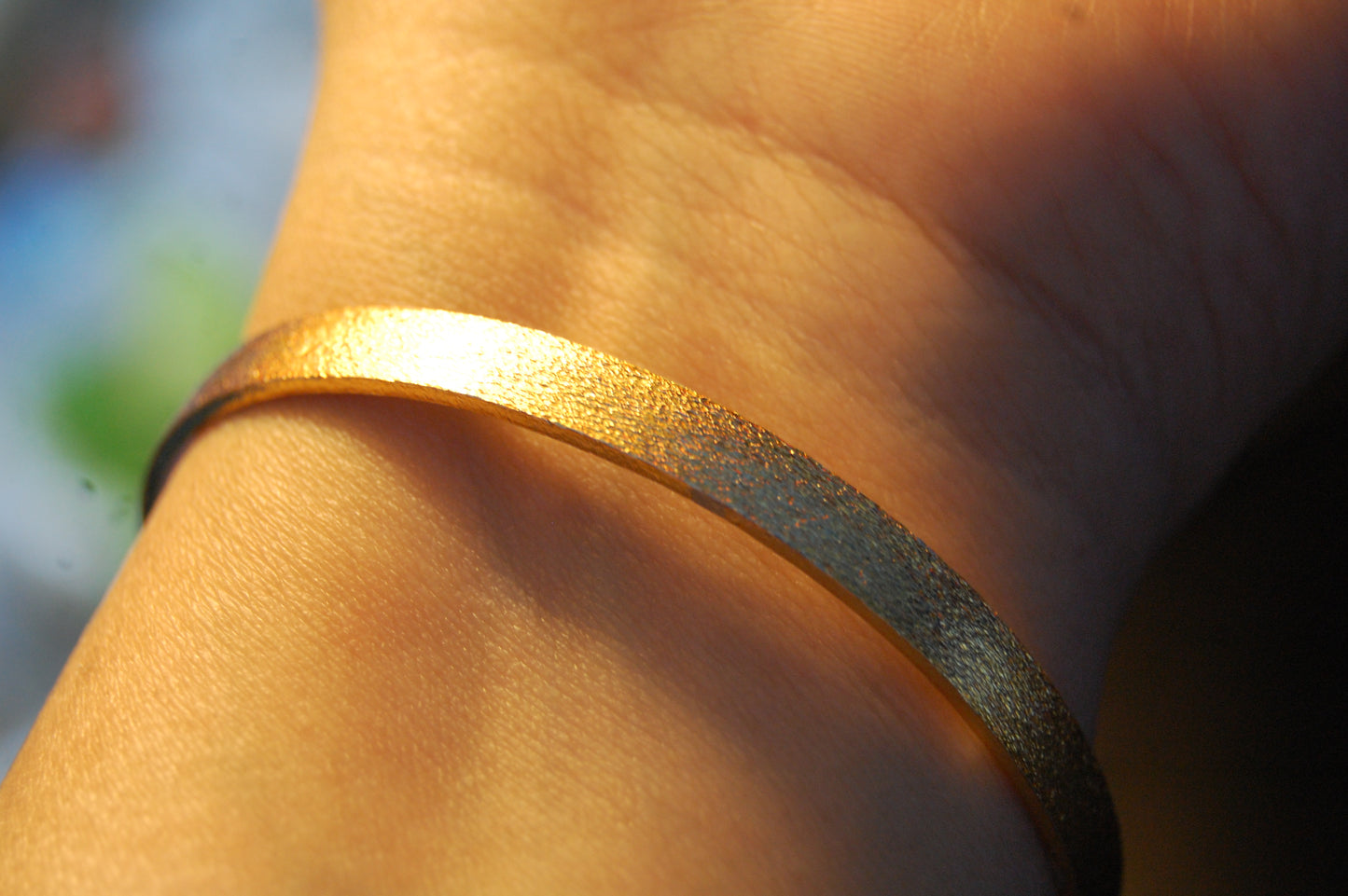 PAIR OF ELEGANT DULL GOLD BANGLES