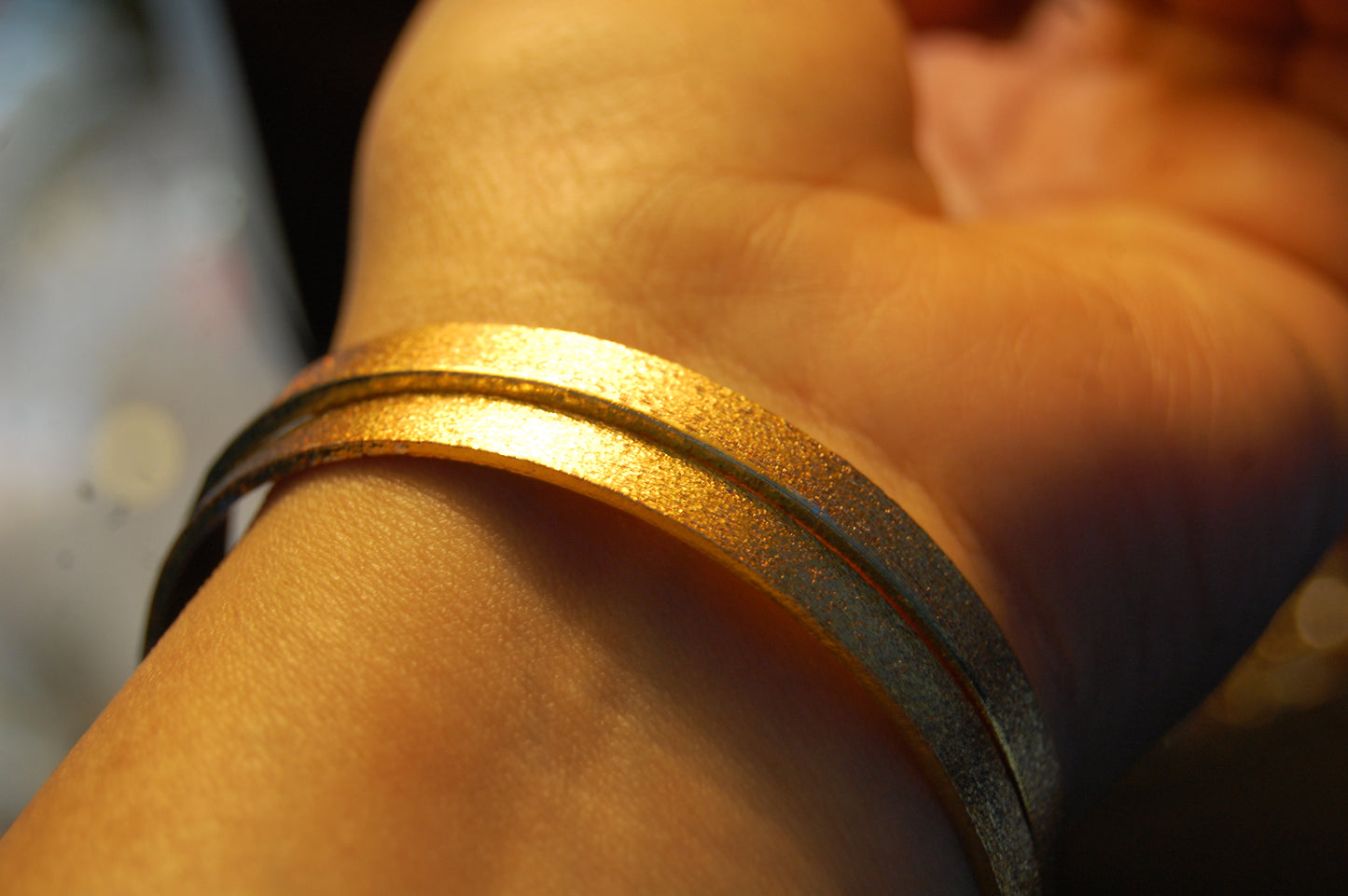 PAIR OF ELEGANT DULL GOLD BANGLES