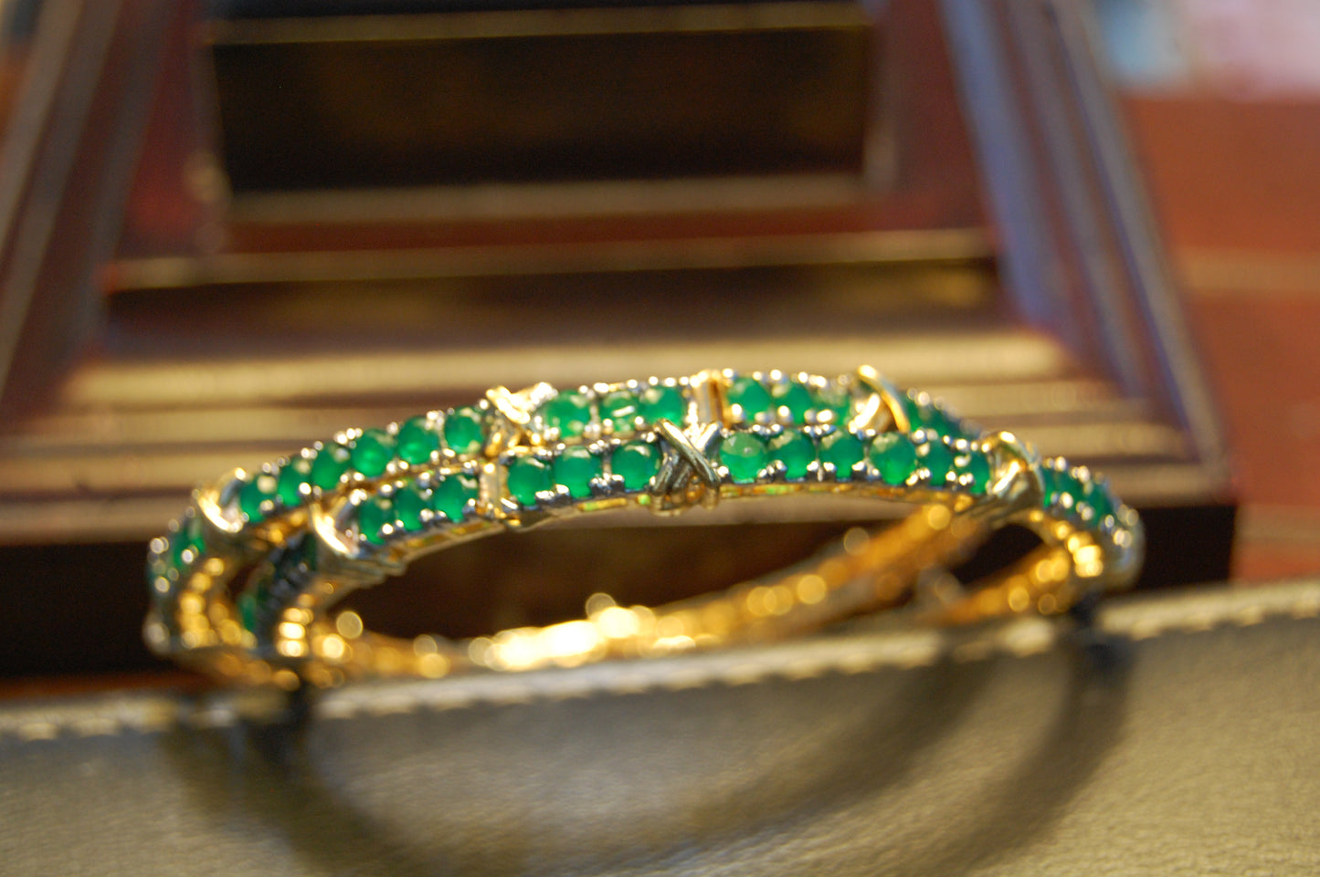PAIR OF OPENABLE GREEN BANGLES