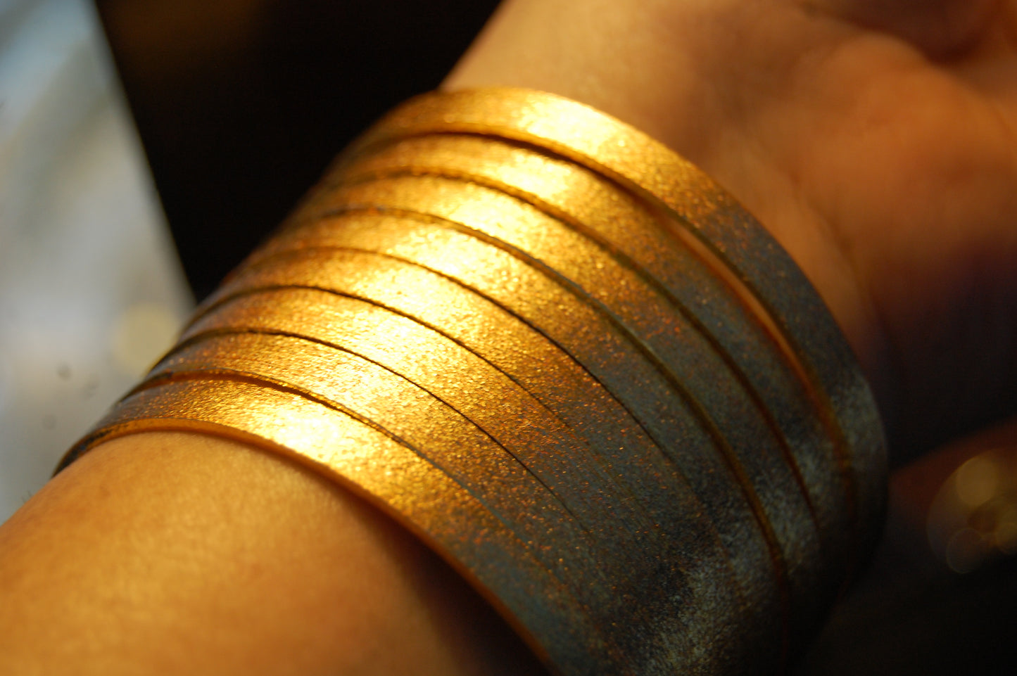 PAIR OF ELEGANT DULL GOLD BANGLES