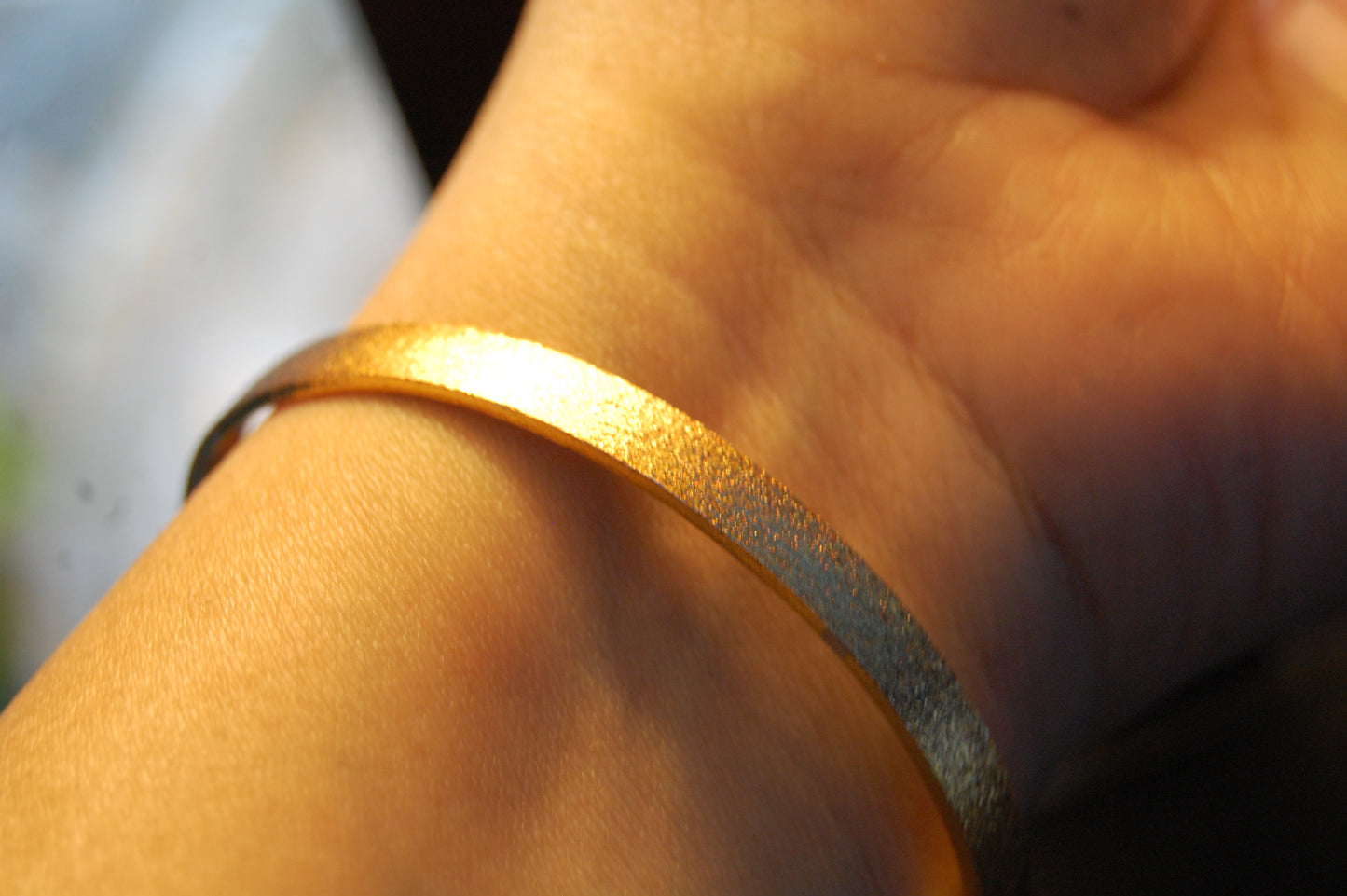 PAIR OF ELEGANT DULL GOLD BANGLES