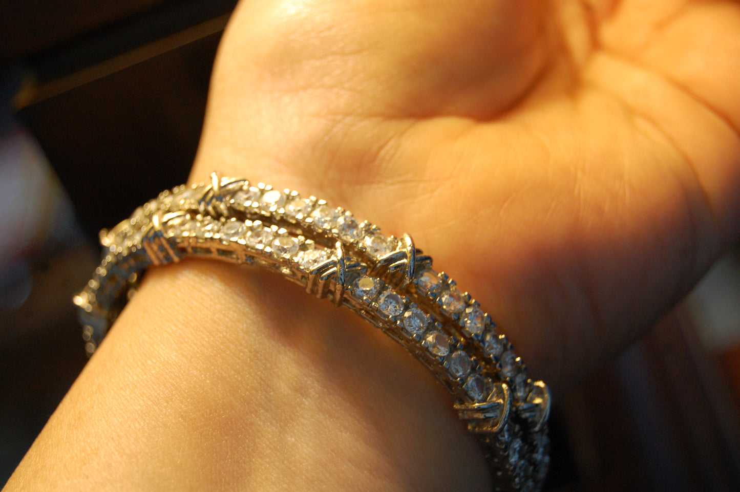 PAIR OF ZIRCON BANGLES (UNOPENABLE)