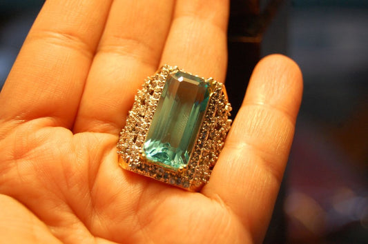 AQUAMARINE COLORED & ZIRCON RING