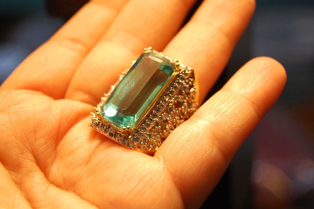 AQUAMARINE COLORED & ZIRCON RING