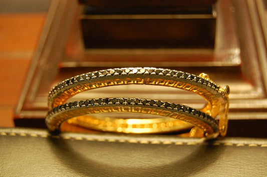 ELEGANT  PAIR OF BLACK BANGLES