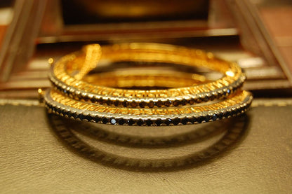 ELEGANT  PAIR OF BLACK BANGLES