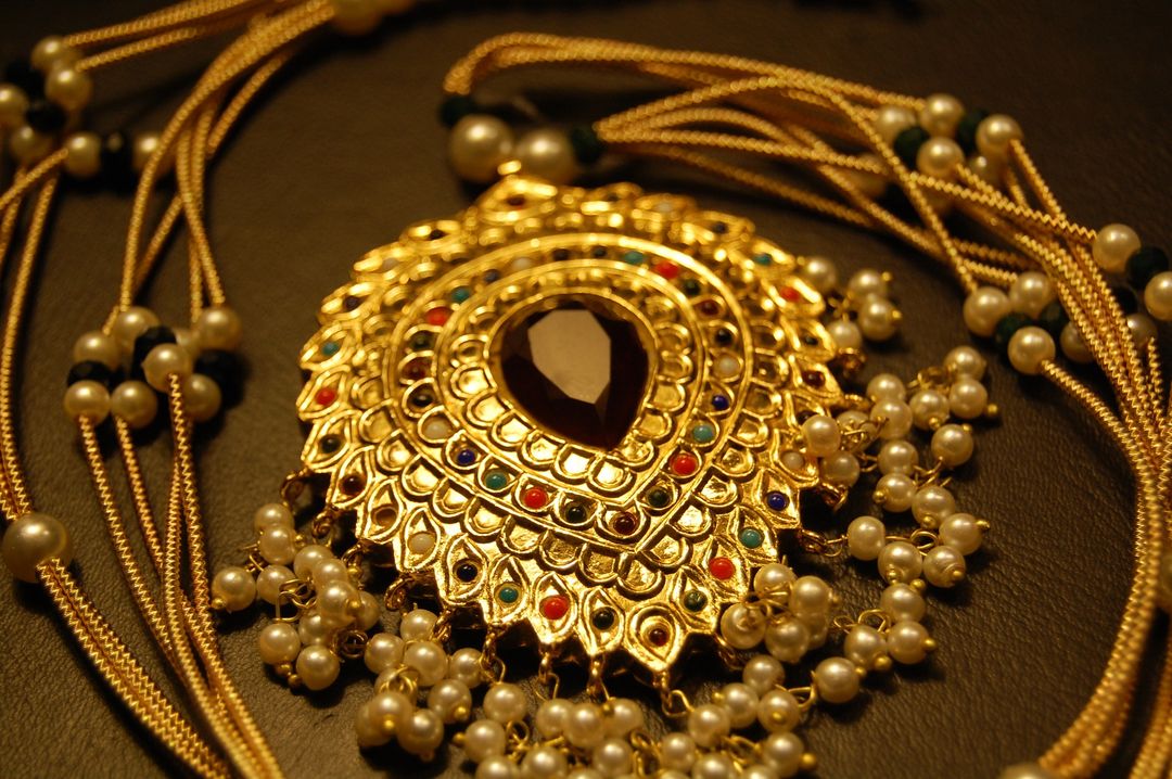 NAURATAN MALA WITH RED STONE