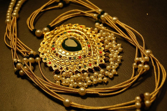 NAURATAN MALA WITH GREEN STONE