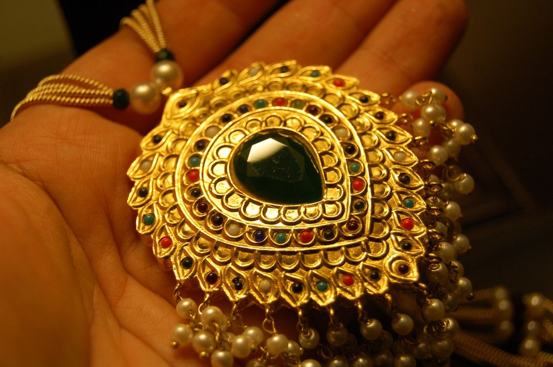 NAURATAN MALA WITH GREEN STONE