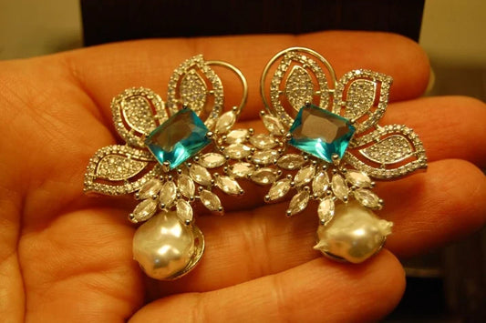 ZIRCON EARRINGS IN FEROZY
