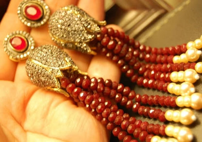 TUSSLE EARRINGS IN RED