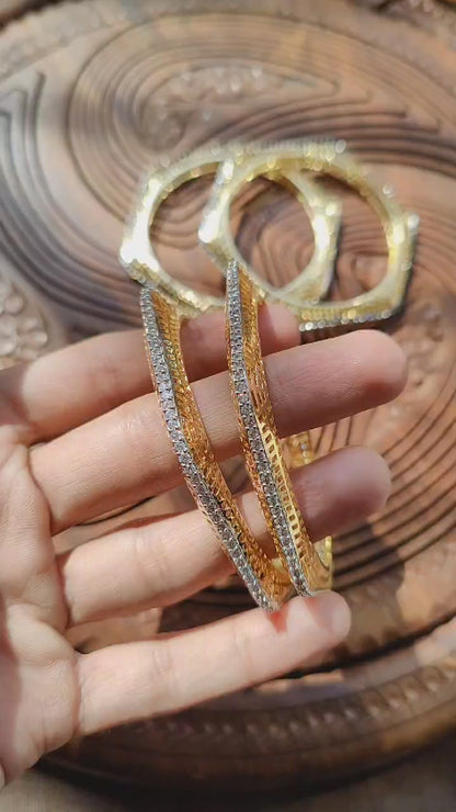 PAIR OF ZIRCON BANGLES