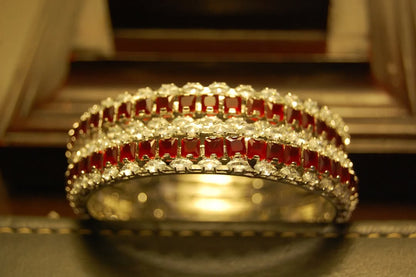 PAIR OF RED & ZIRCON BANGLES IN SILVER BASE