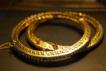 PAIR OF OPENABLE ZIRCON BANGLES