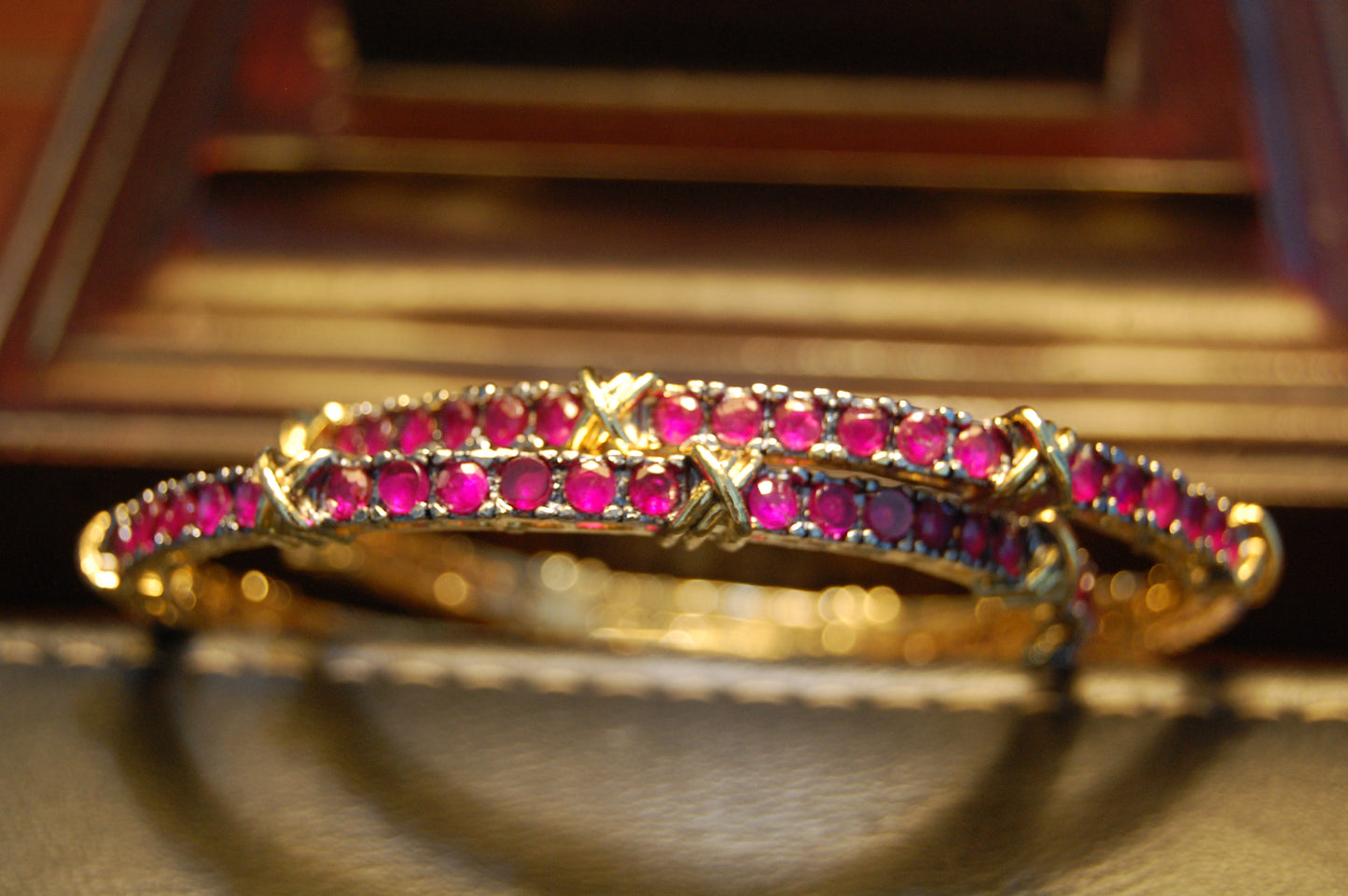 PAIR OF RUBY RED BANGLES (UNOPENABLE)