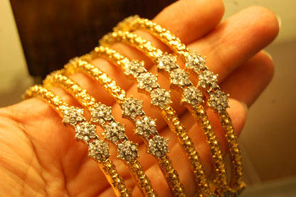 PAIR OF ELEGANT FLORAL ZIRCON BANGLE