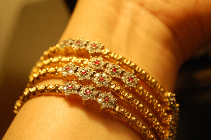 PAIR OF ELEGANT FLORAL RED & ZIRCON BANGLE