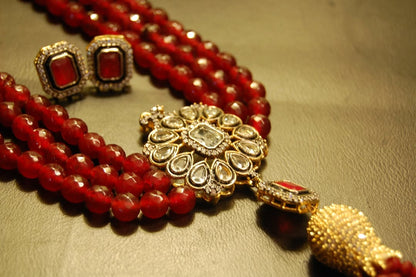 RUBY RED LONG MALA WITH TUSSEL