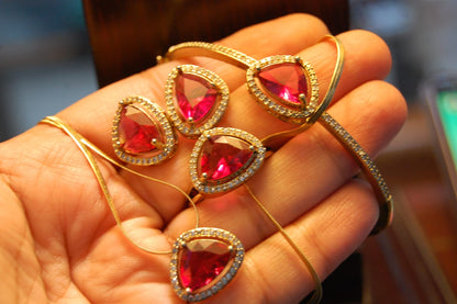 PENDENT SET IN REDISH PINK