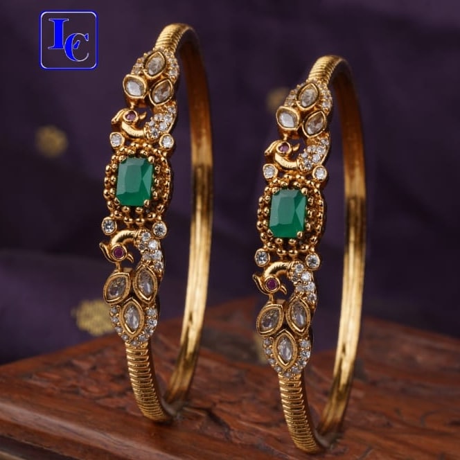 PAIR OF GREEN PEACOCK BANGLES