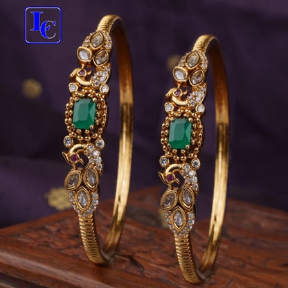 PAIR OF GREEN PEACOCK BANGLES