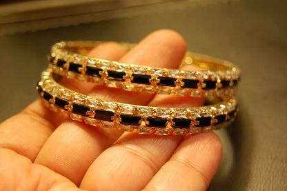 PAIR OF BLACK & ZIRCON BANGLES IN GOLDEN BASE