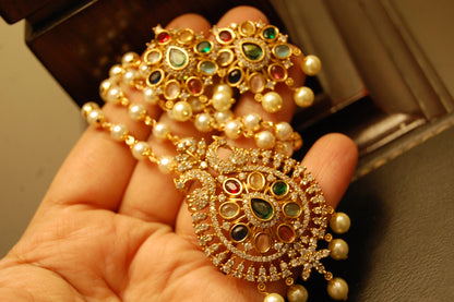 INDIAN MULTI JEWELLED PENDENT IN PEARL STRING