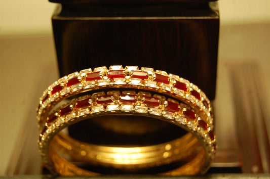 PAIR OF RED & ZIRCON BANGLES IN GOLDEN BASE