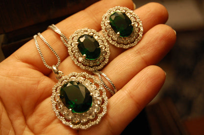 EMERALD GREEN PENDENT SET IN ZIRCONS
