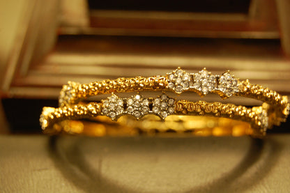 PAIR OF ELEGANT FLORAL ZIRCON BANGLE