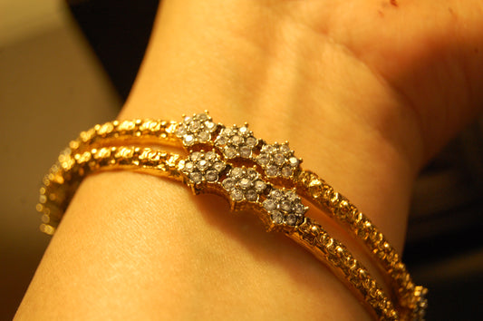 PAIR OF ELEGANT FLORAL ZIRCON BANGLE