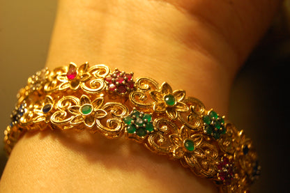 PAIR OF MULTI STONE BANGLES