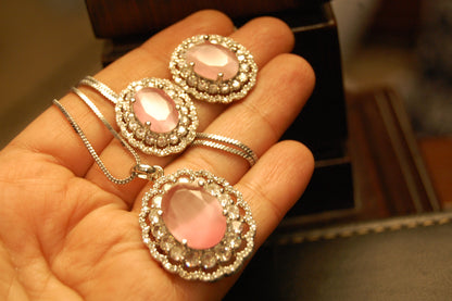 PINK PENDENT SET IN ZIRCONS