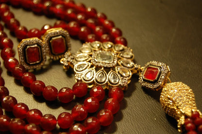 RUBY RED LONG MALA WITH TUSSEL