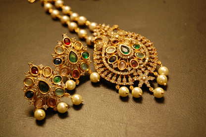 INDIAN MULTI JEWELLED PENDENT IN PEARL STRING