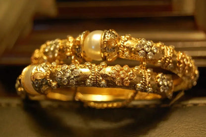 PAIR OF ZIRCON & PEARL BANGLES