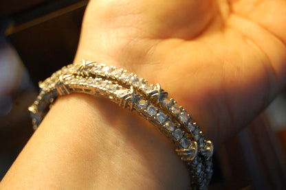 PAIR OF ZIRCON BANGLES (UNOPENABLE)