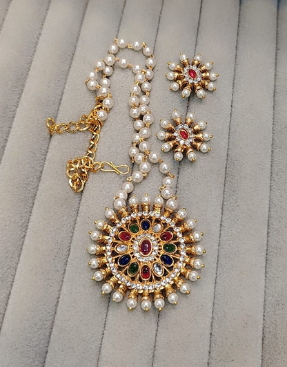 INDIAN MULTI JEWELLED PENDENT IN PEARL STRING